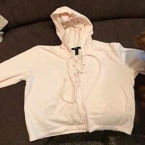 Light pink forever 21 lace up cropped hoodie